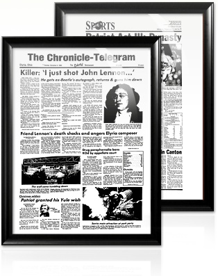 Framed examples of full-sized newspaper page reproductions